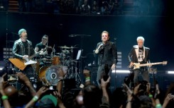 Irish rockers U2 - comprising Bono, The Edge, Adam Clayton and Larry Mullen Jr. - perform at The Forum in Inglewood, California in 2018