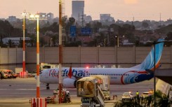 A flydubai Boeing 737 MAX 8 aircraft is pictured on the tarmac after landing at Israel's Ben Gurion Airport on Wednesday