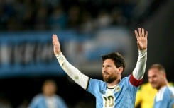 Lionel Messi celebrates scoring in his final international appearance for Argentina