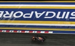 Red Bull's Max Verstappen drives at the Singapore Grand Prix last year, whert he finished second to George Russell's Mercedes
