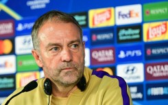 Barcelona's German coach Hansi Flick speaks during a press conference at Rams Park Stadium in Istanbul