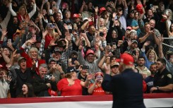 Supporters cheer US President Donald Trump at a rally in Kalispell, Montana, on stop in a campaign tour ahead of November 3 midterm elections