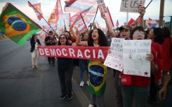 Brazil's left has mobilized with massive student-led demonstrations, with supporters wearing the red of President Luiz Inacio Lula da Silva's Workers' Party