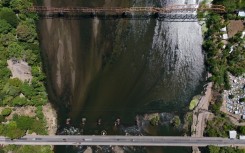A prolonged lack of rainfall, associated with the El Nino phenomenon, has sharply reduced the flow of Lempa River, El Salvador's main river, worsening water shortages affecting agriculture, livestock and rural communities