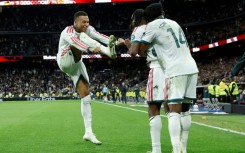 Kylian Mbappe scored twice as Real Madrid romped to a 4-1 victory over Sevilla in La Liga on Sunday