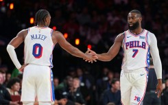 Tyrese Maxey celebrates with Philadelphia 76ers team-mate Jaylen Brown in their win over Milwaukee