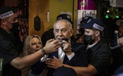 Israeli Prime Minister Benjamin Netanyahu speaks in Ben Yehuda Market during a campaign visit in Jerusalem on October 22, 2026