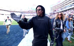 Rapper Jay-Z, shown on the sideline at last season's Super Bowl, will serve as the halftime musical performer at next February's Super Bowl in Los Angeles, the NFL announced