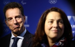 Geoffroy Roux de Bezieux (L) alongside France's Sports Minister Marina Ferrari