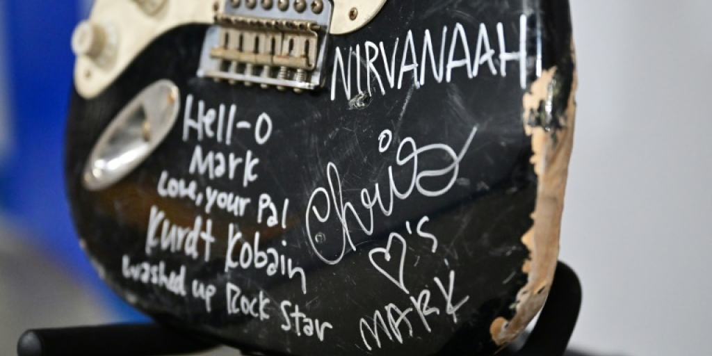 Guitar smashed by Nirvanas Kurt Cobain sells for nearly 600000 Guitar smashed by Nirvanas Kurt Cobain sells for nearly 600000